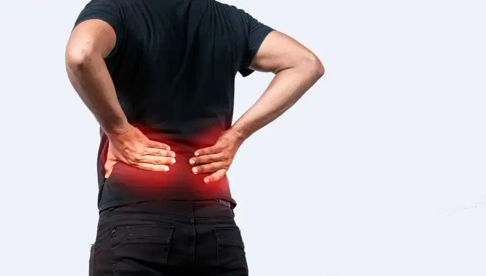 A Sore Man With Back Pain, Man With Spine Problems, Person With Back Problems On Isolated Background, Lumbar Problems Concept